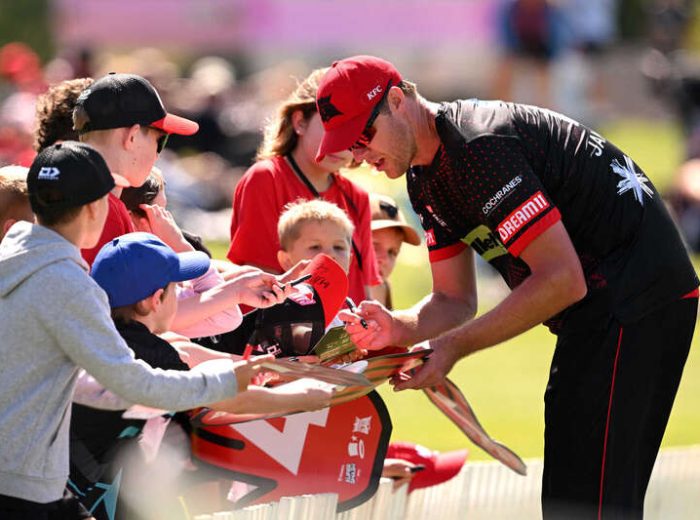 Kyle Jamison of Canterbury signs autographs during the Dream11 Super Smash game between the Canterbury Kings and the Otago Volts at Hagley Oval on the 7th of January 2025, in Christchurch, New Zealand. (Image by Joe Allison / Photosport NZ)