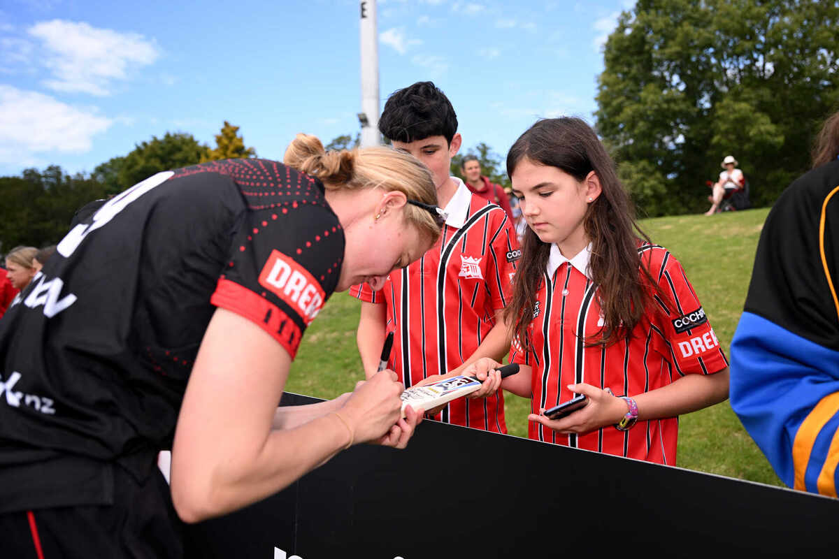 Gabby Sullivan of Canterbury signs autographs followign the Dream11 Super Smash game between the Canterbury Magicians and the Auckland Hearts at Hagley Oval on the 10th of January 2025, in Christchurch, New Zealand. (Image by Joe Allison / Photosport NZ)